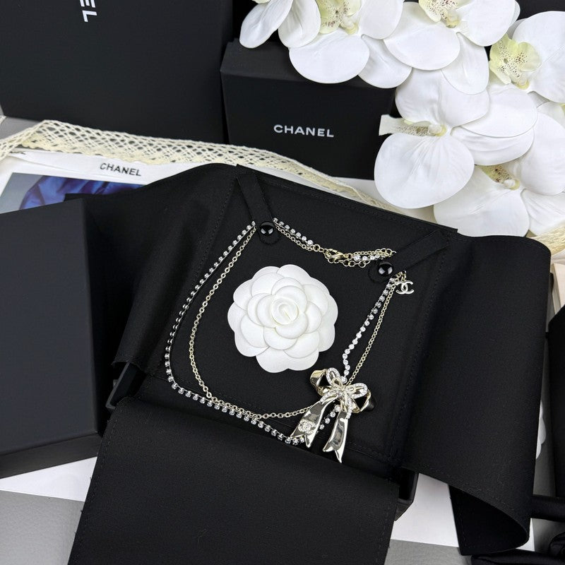 18K  Chanel 25K Bow Tie Diamond Gold Necklace